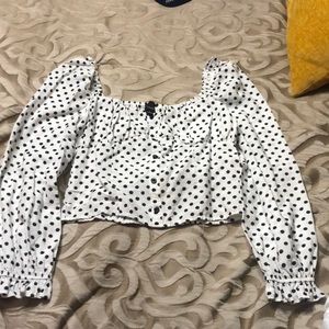 White top with pocket dots